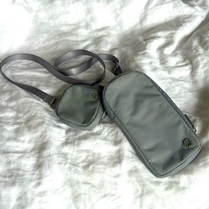 Cross body ear bud phone carrier like new used twice